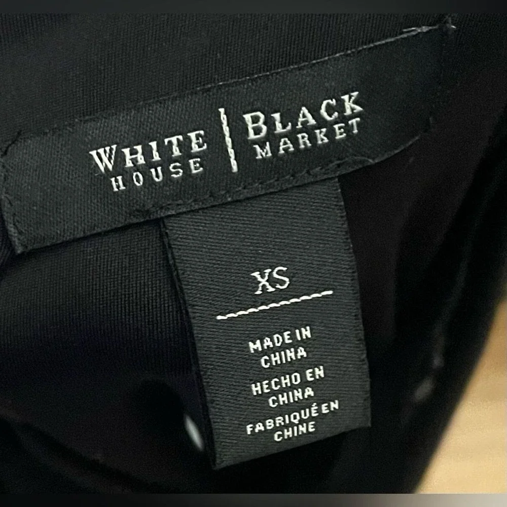 White House black market- Black mini dress with some‎ bedazzled detailing SizeXS